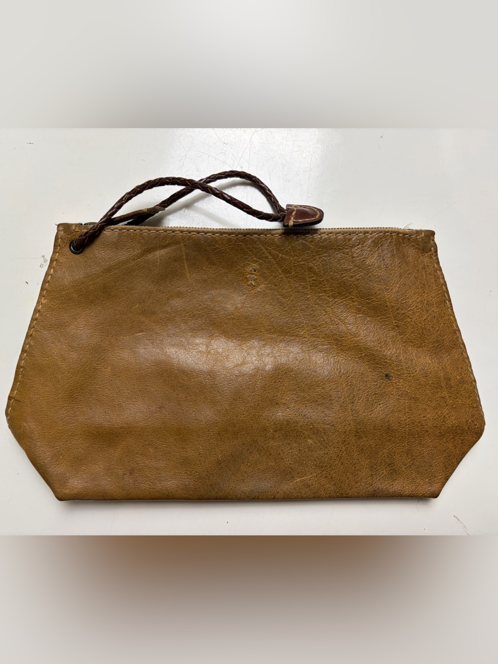 Henry Beguelin brown leather cosmetic bag